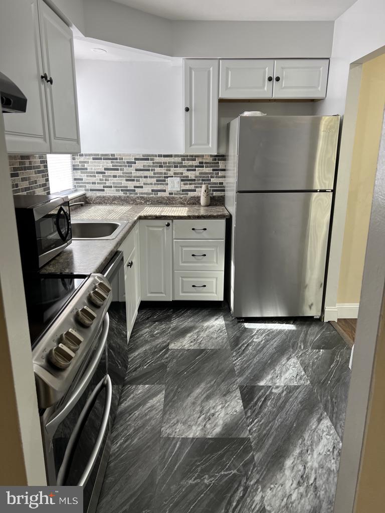 1908 Springfield Road Darby, PA 19023 - Photo 5 of 21 Updated Kitchen w/Stainless Steel Appliances