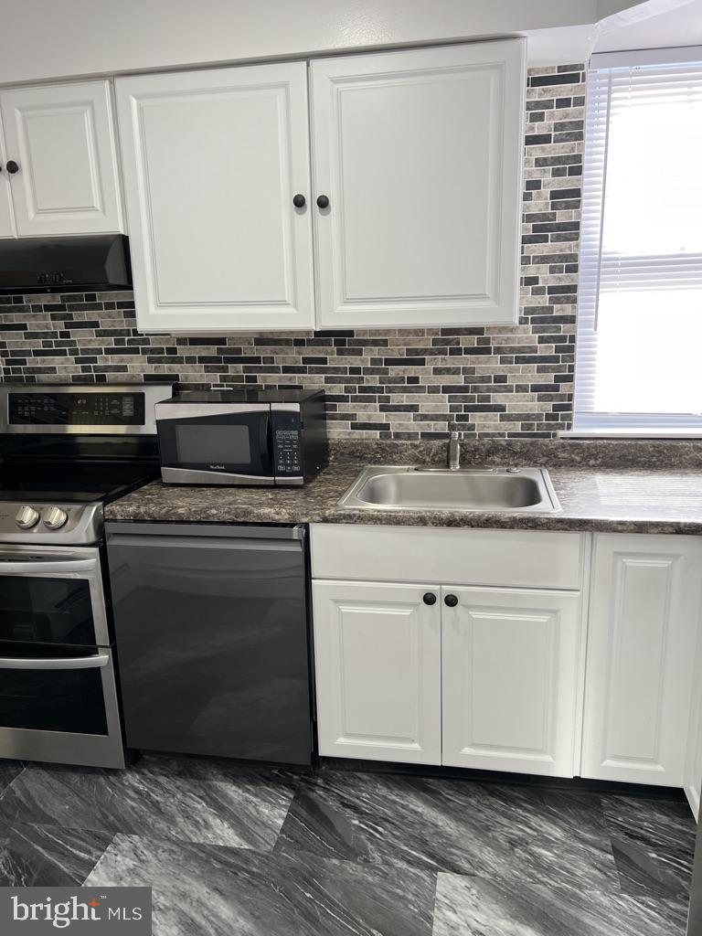 1908 Springfield Road Darby, PA 19023 - Photo 6 of 21 Front view of Kitchen