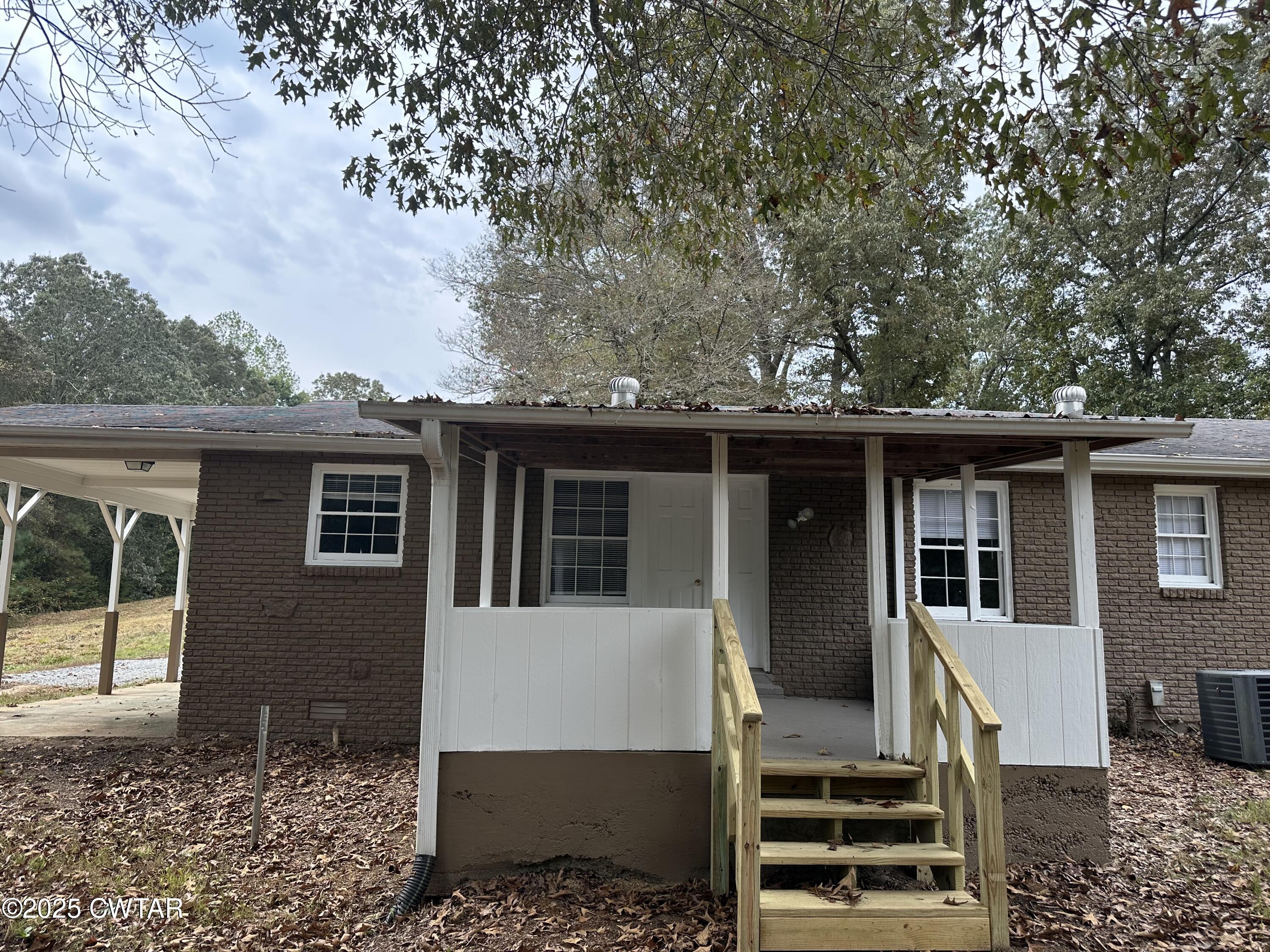 2400 Peddy Vestal Loop Henderson, TN 38340 - Photo 36 of 40 a house view with a outdoor space
