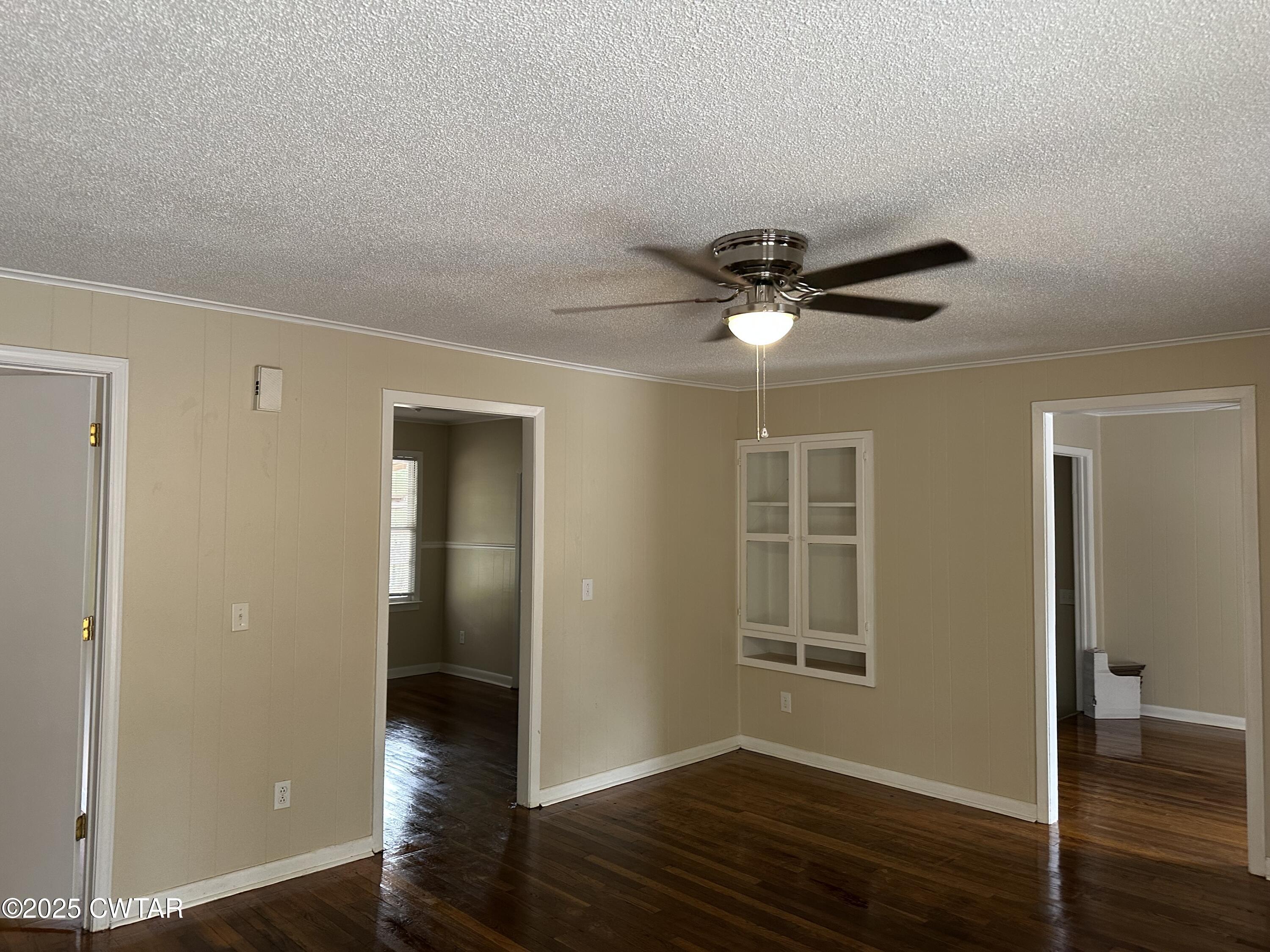 2400 Peddy Vestal Loop Henderson, TN 38340 - Photo 8 of 40 a view of livingroom with hardwood floor and ceiling fan