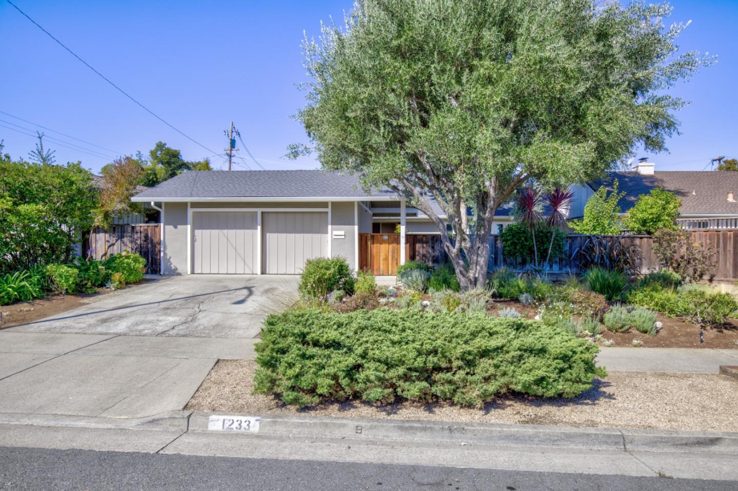 1233 Weymoth Drive Cupertino, CA 95014 - Photo 1 of 1 front view of a house with a yard