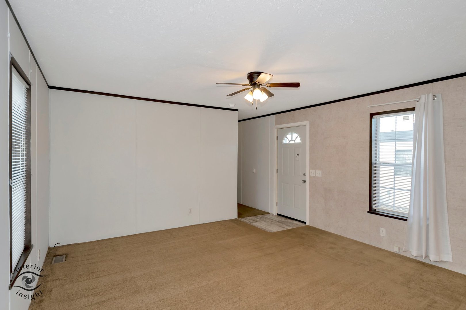 37 St George Bourbonnais, IL 60914 - Photo 6 of 27 an empty room with windows and fan