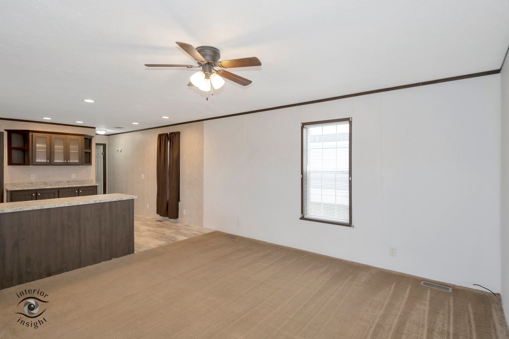 37 St George Bourbonnais, IL 60914 - Photo 7 of 27 a view of a livingroom with a ceiling fan and window