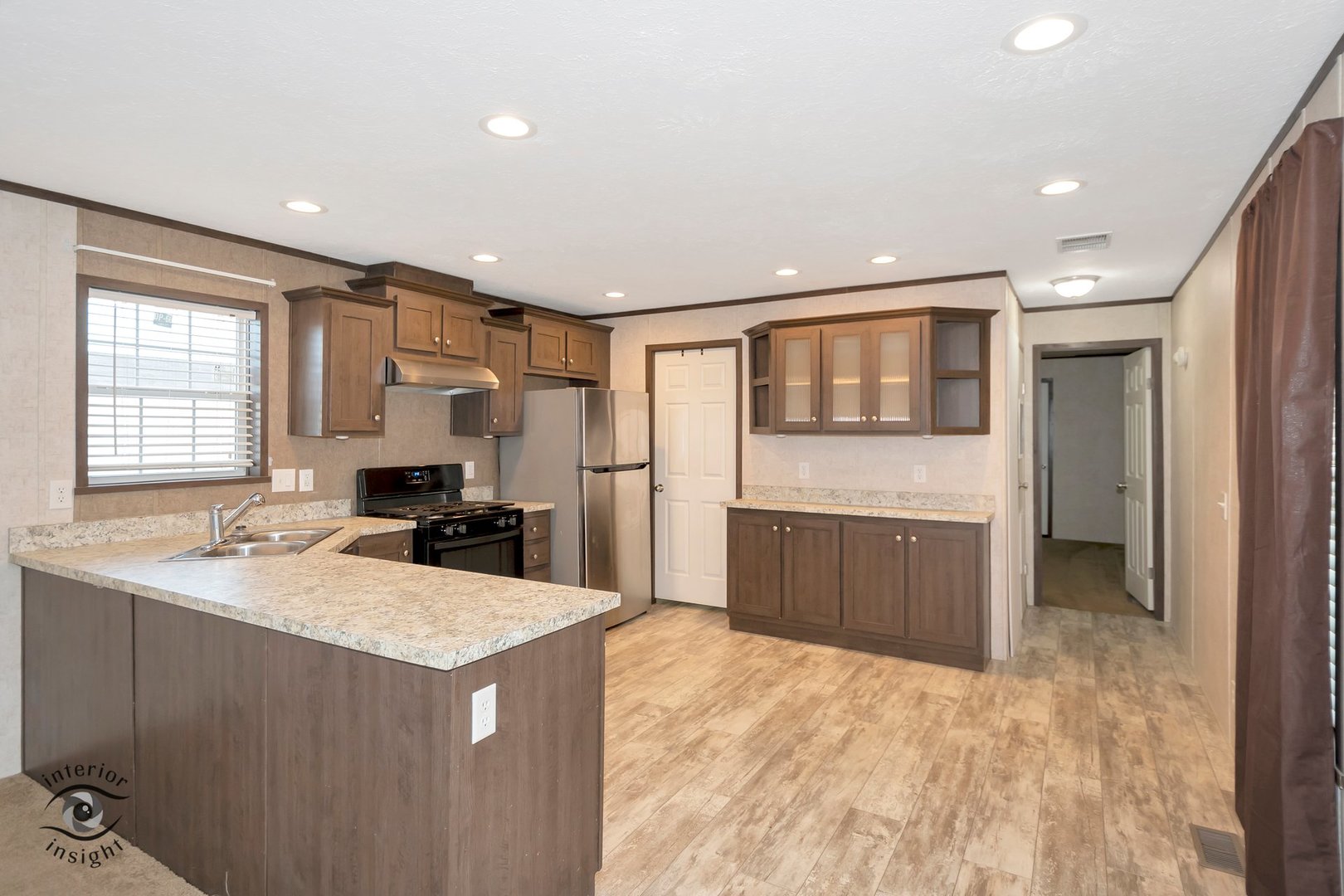 37 St George Bourbonnais, IL 60914 - Photo 8 of 27 a kitchen with a stove a refrigerator and a sink