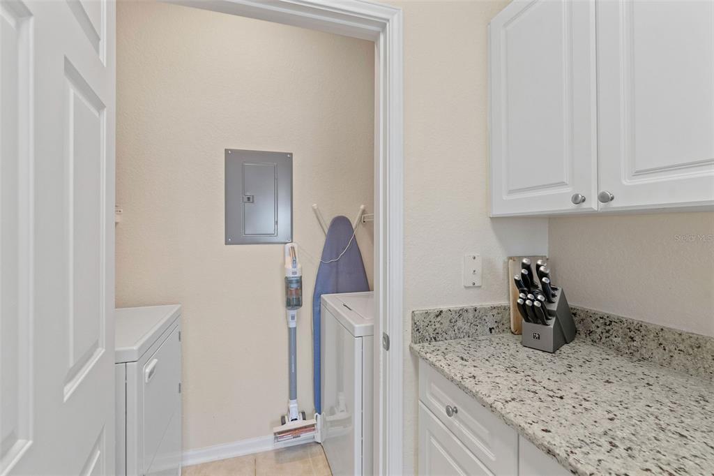 1216 South Missouri Avenue, Unit 419 Clearwater, FL 33756 - Photo 17 of 22 a kitchen with a sink and cabinets