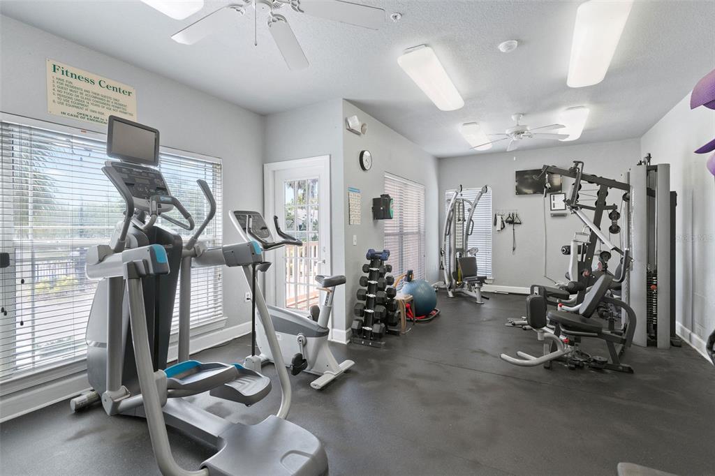 1216 South Missouri Avenue, Unit 419 Clearwater, FL 33756 - Photo 20 of 22 a view of a room with gym equipment