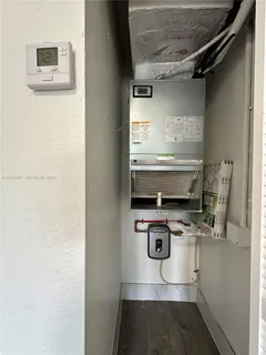 a kitchen with a stove and a microwave
