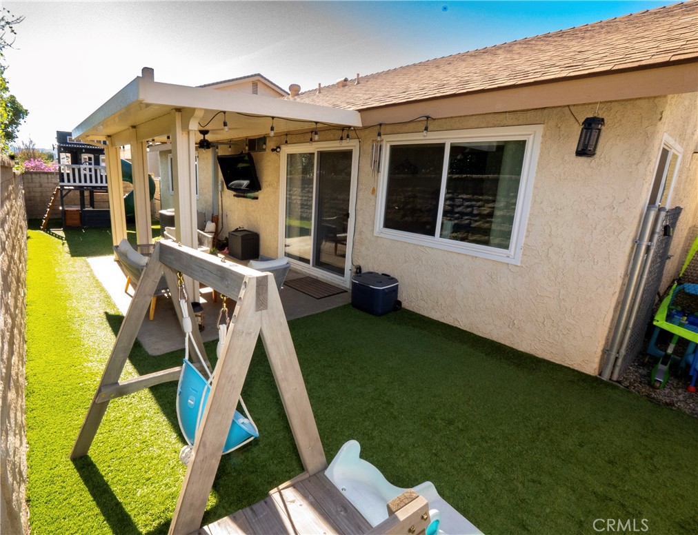 27626 Saffron Lane Saugus, CA 91350 - Photo 18 of 24 a view of a house with backyard