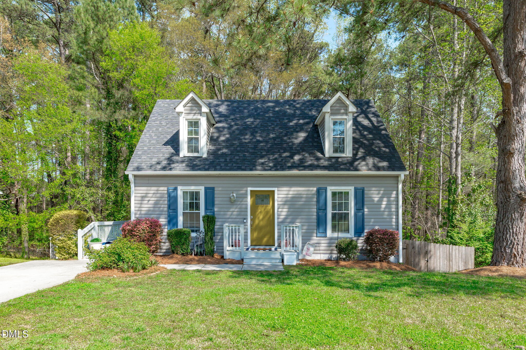 717 Habersham Place Raleigh, NC 27610 - Photo 1 of 59 front view of a house with a yard