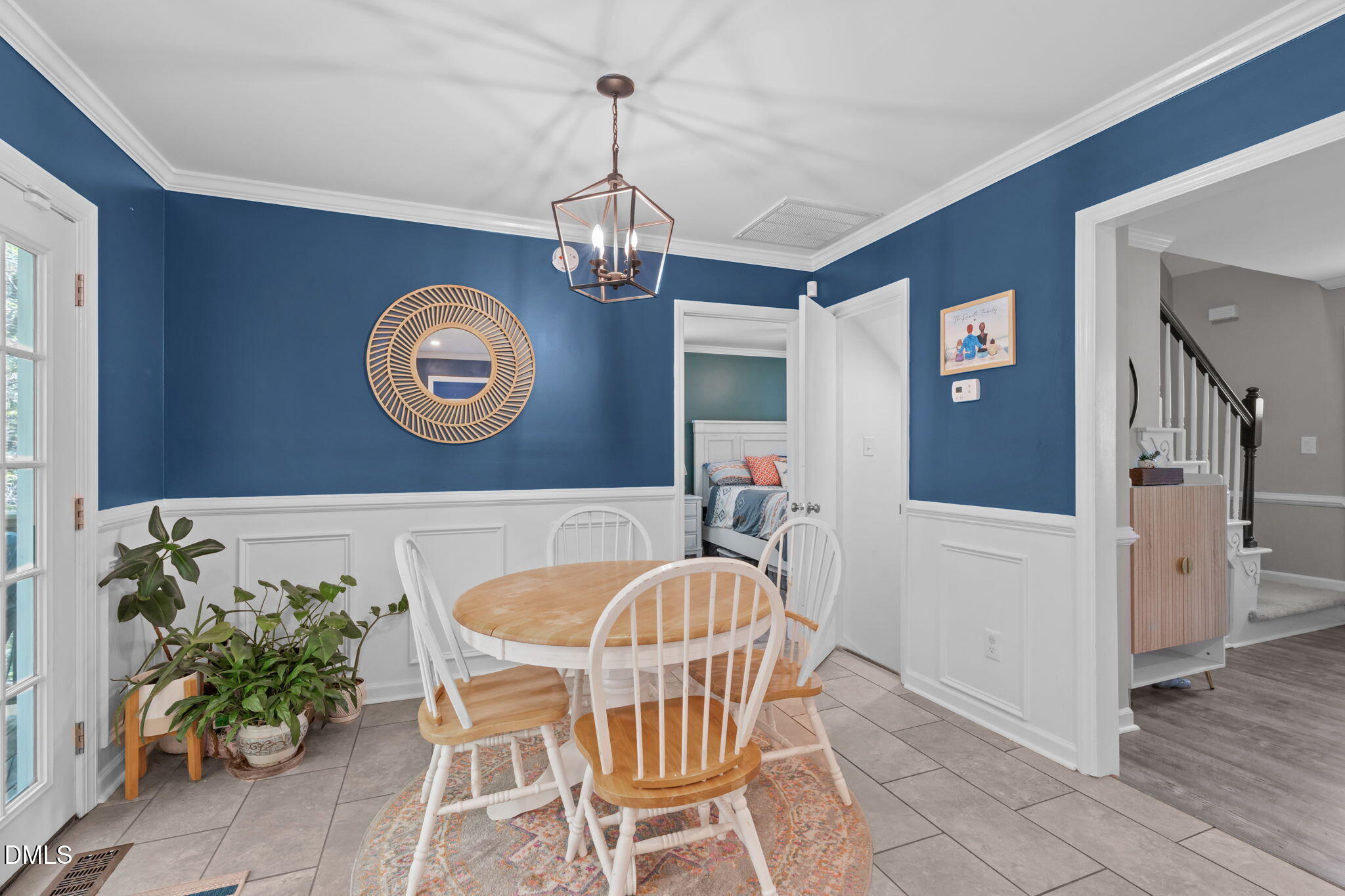 717 Habersham Place Raleigh, NC 27610 - Photo 11 of 59 a view of a dining room and kitchen