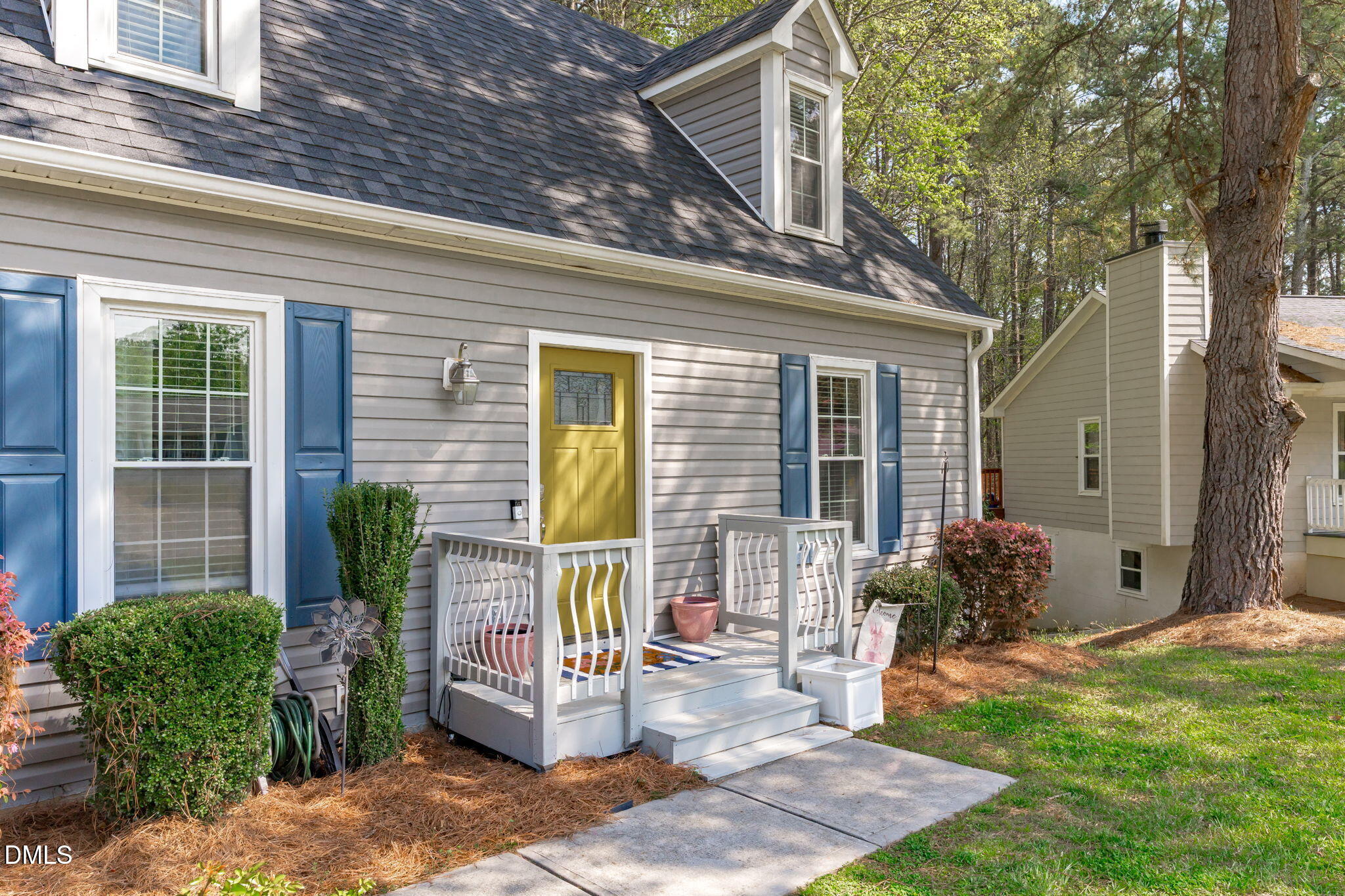 717 Habersham Place Raleigh, NC 27610 - Photo 2 of 59 a front view of a house with garden