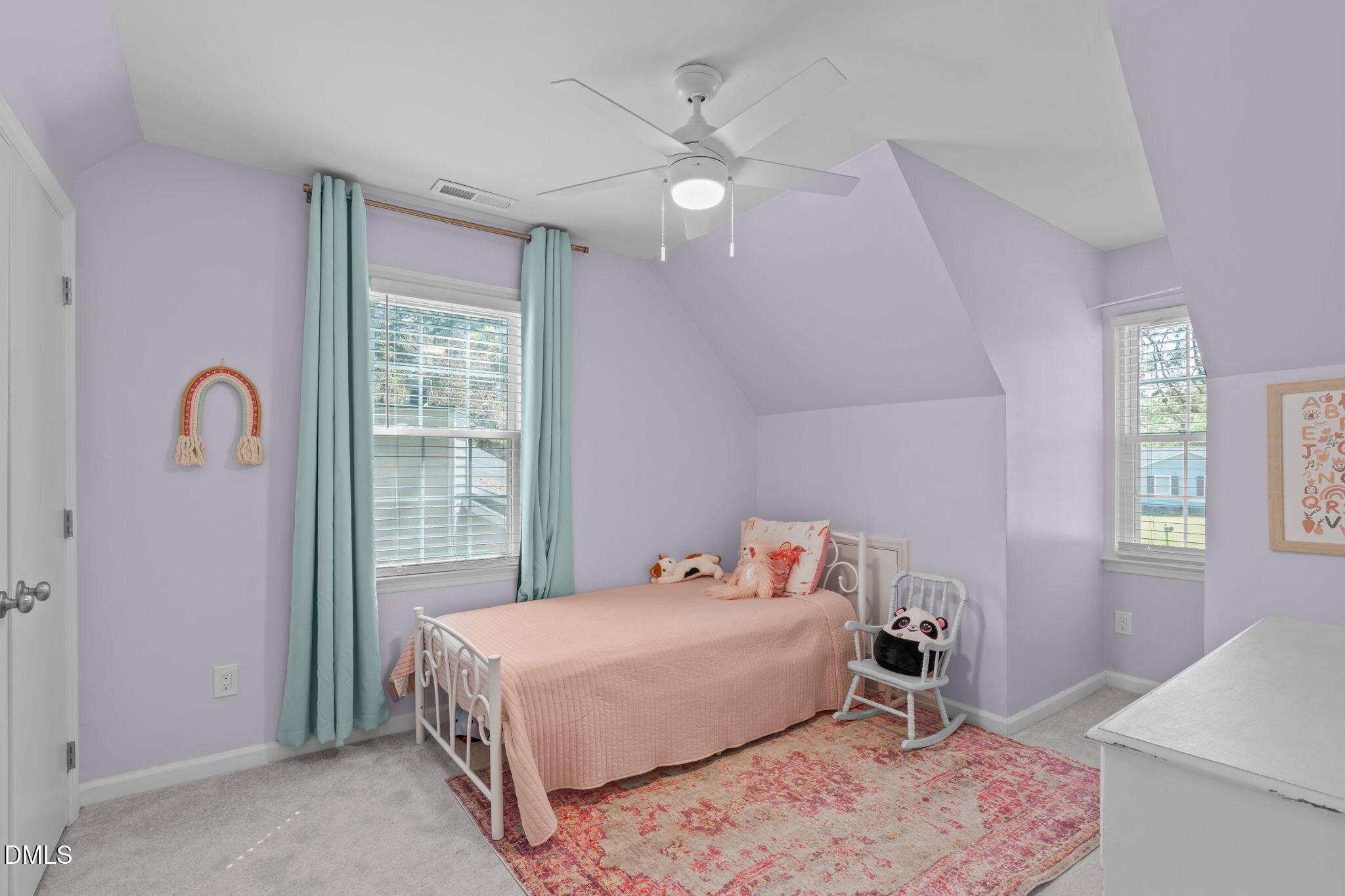 717 Habersham Place Raleigh, NC 27610 - Photo 22 of 59 a bed room with a bed and a window