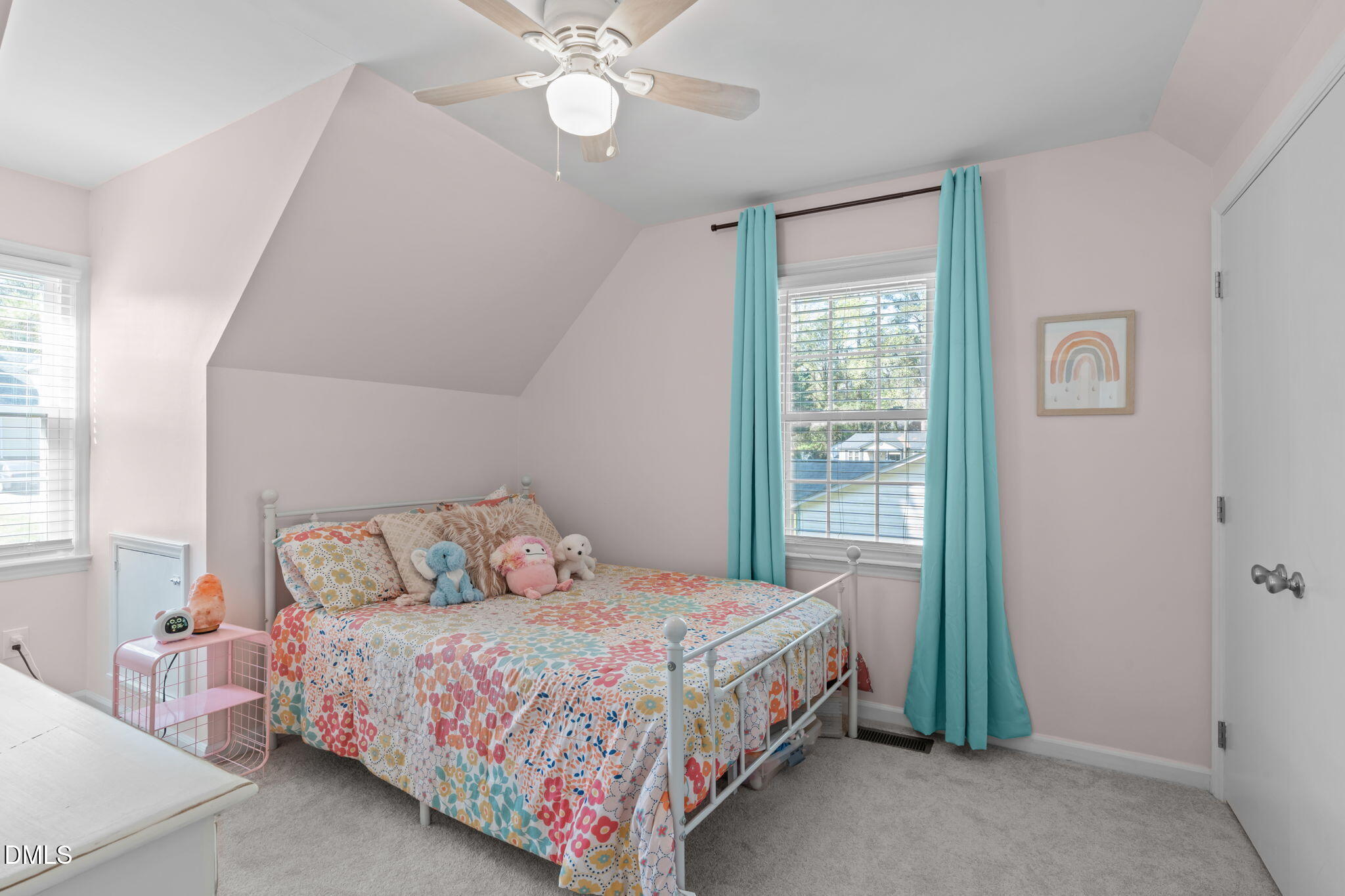 717 Habersham Place Raleigh, NC 27610 - Photo 25 of 59 a bedroom with a bed and a window