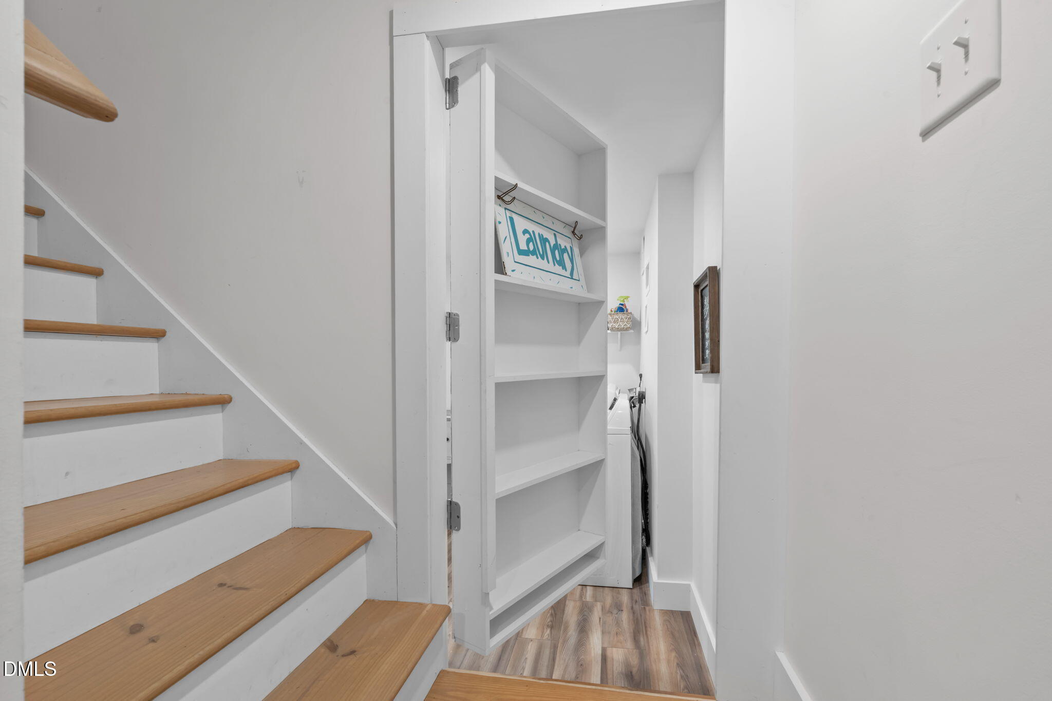 717 Habersham Place Raleigh, NC 27610 - Photo 28 of 59 a view of a hallway with wooden floor and entryway