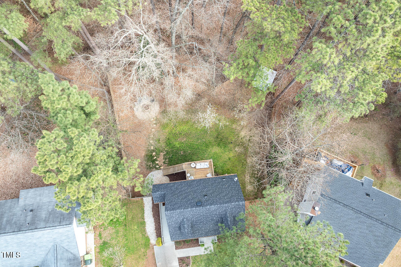 717 Habersham Place Raleigh, NC 27610 - Photo 50 of 59 an aerial view of a house with a yard
