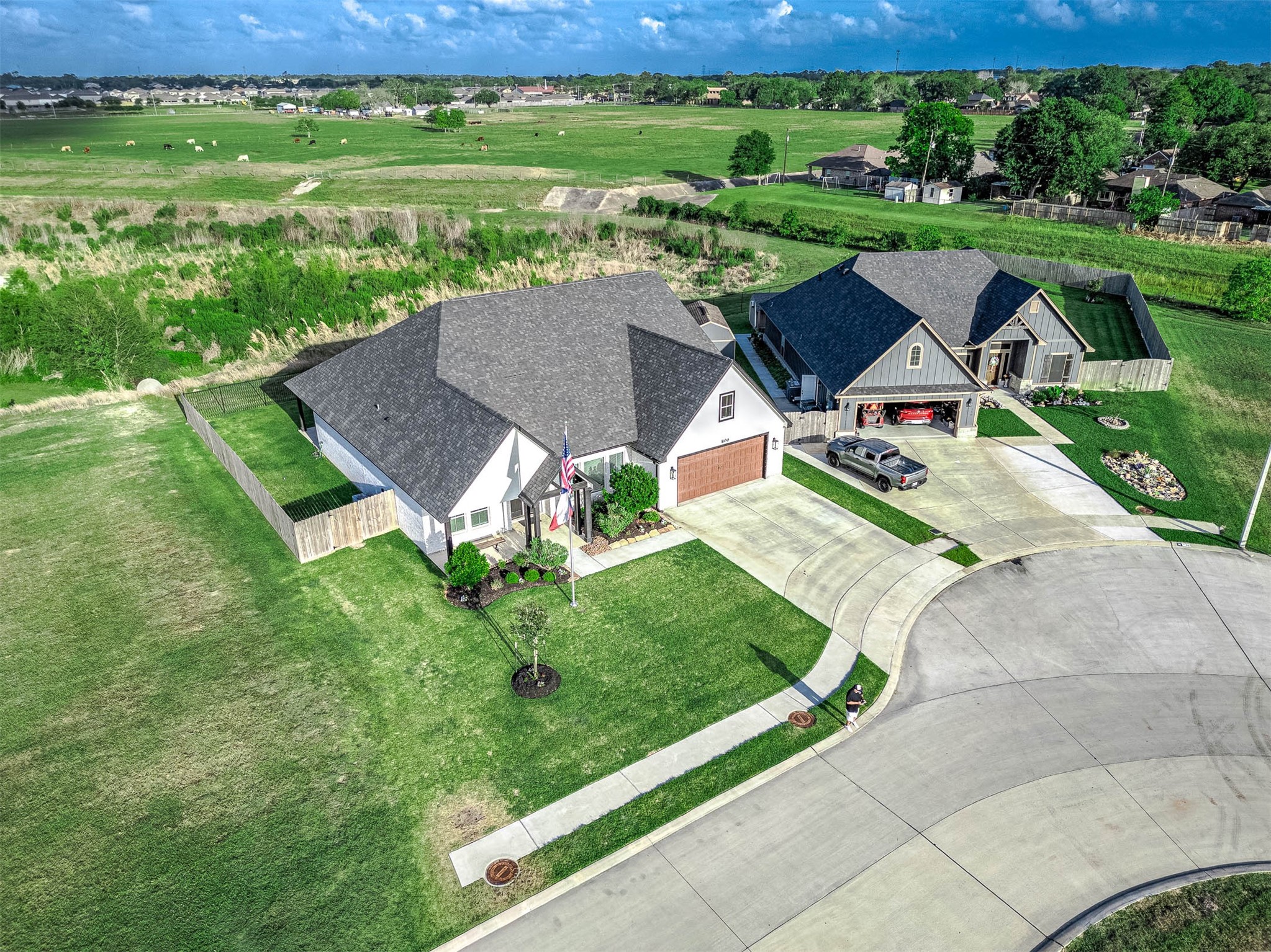 800 Greystone Lane Angleton, TX 77515 - Photo 46 of 49 a view of a table and chairs in backyard