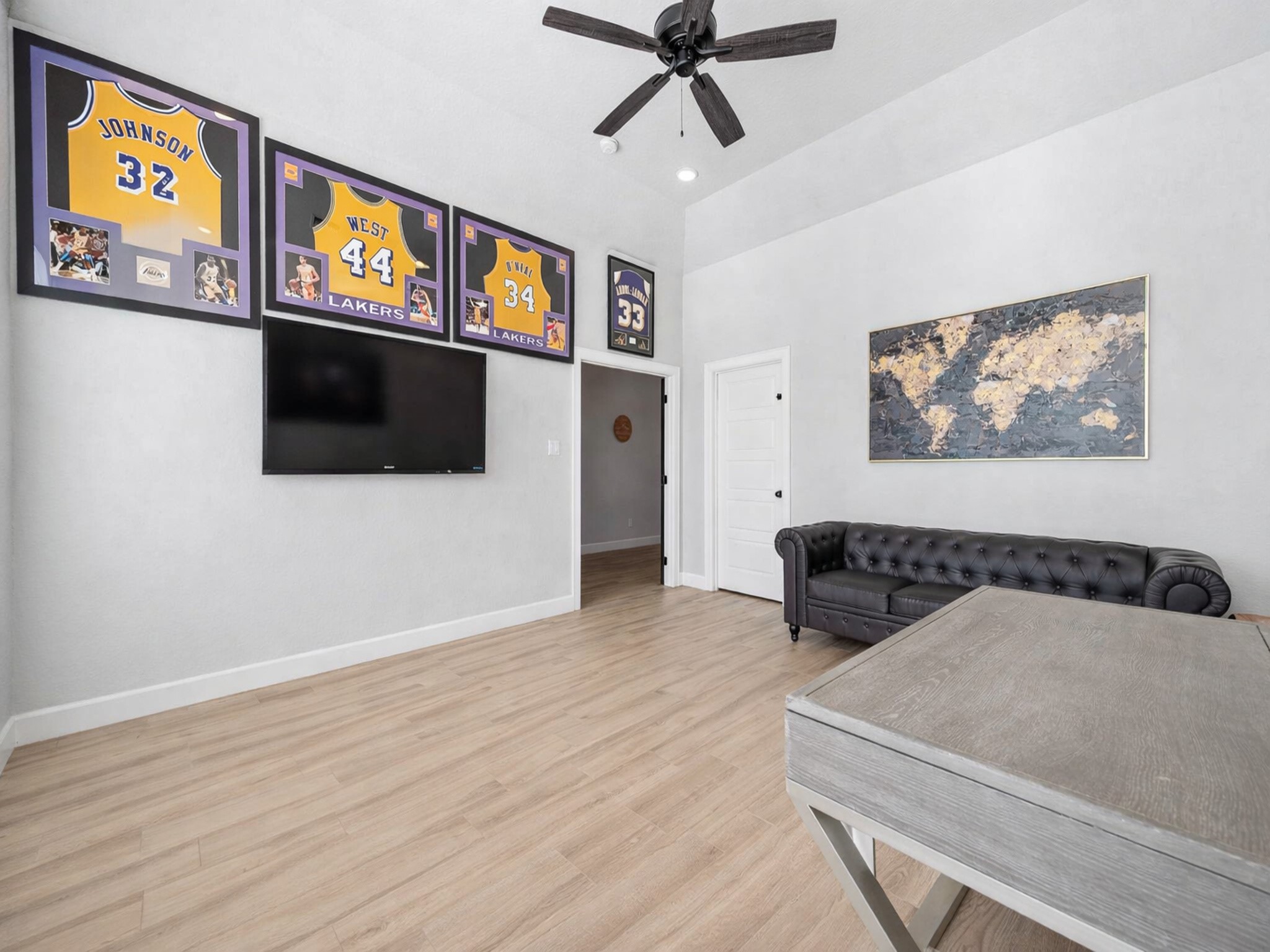 800 Greystone Lane Angleton, TX 77515 - Photo 7 of 49 a living room with furniture and a flat screen tv