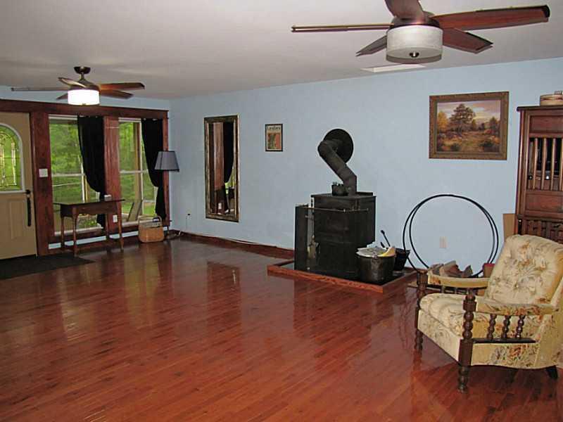 47 Oak Hill Road Belfast, ME 04915 - Photo 8 of 35 Den/Family/Great Room. Wood Stove...