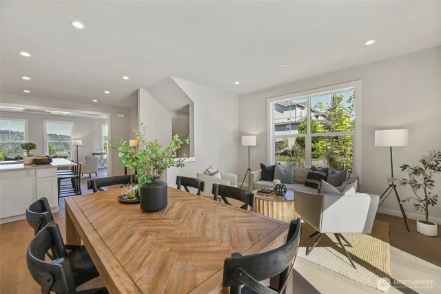 a view of a dining room with furniture window and outside view