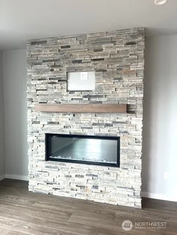 a stove top oven sitting inside of a kitchen