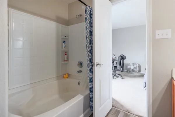 a bathroom with a bathtub