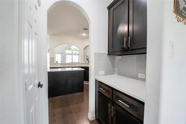 a view of a kitchen with a sink
