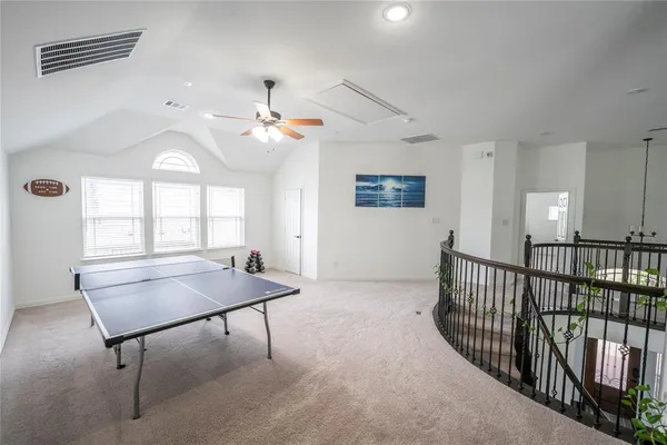 a view of a livingroom with furniture and window