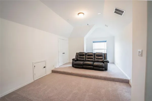 a room with a car parked in it