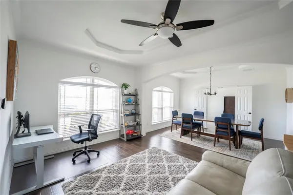 a living room with furniture or couch and a window