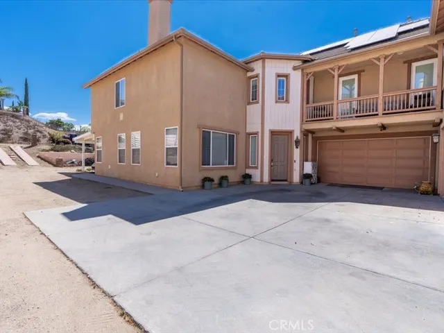 a front view of a house with yard