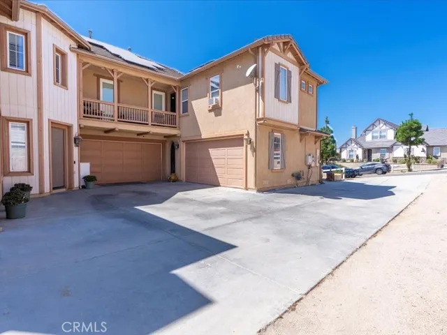 a front view of a house with yard
