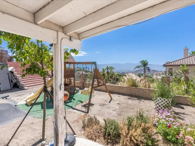a house view with a garden space