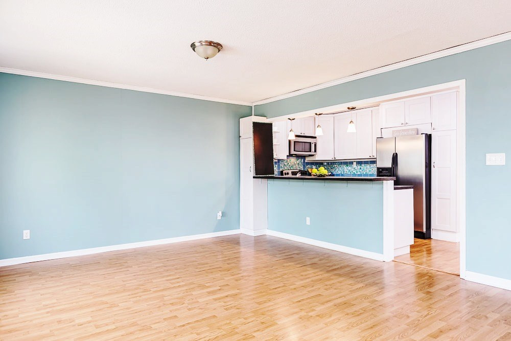 7616 Idolbrook Lane Raleigh, NC 27615 - Photo 7 of 26 Family Room/Kitchen