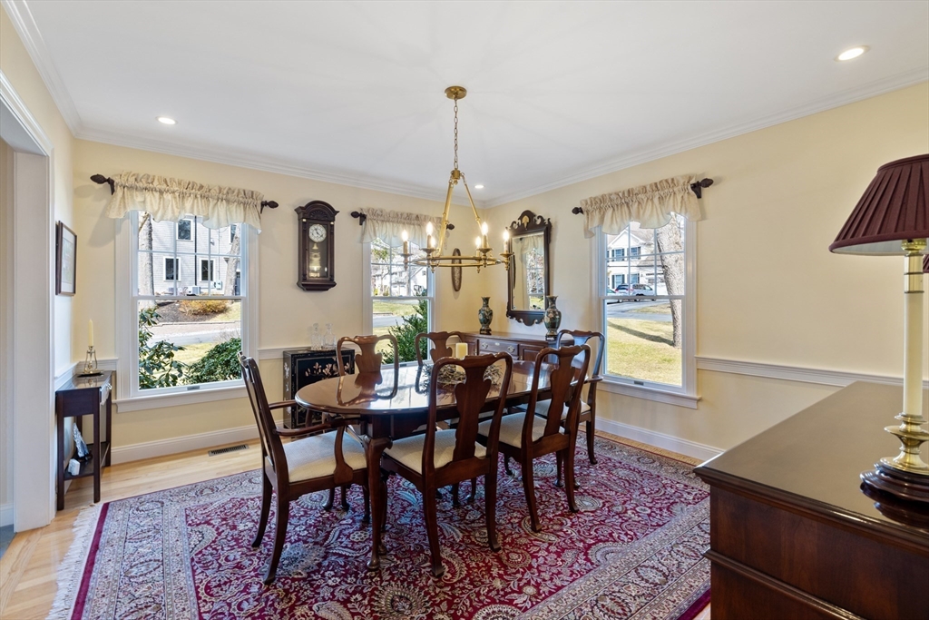 2 Marlboro Road Lexington, MA 02421 - Photo 12 of 36 a view of a dining room with furniture window and wooden floor