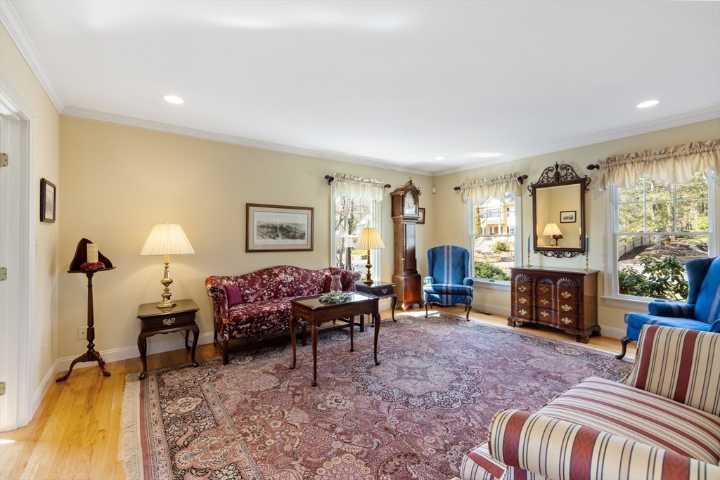 2 Marlboro Road Lexington, MA 02421 - Photo 15 of 36 a living room with furniture and a fireplace