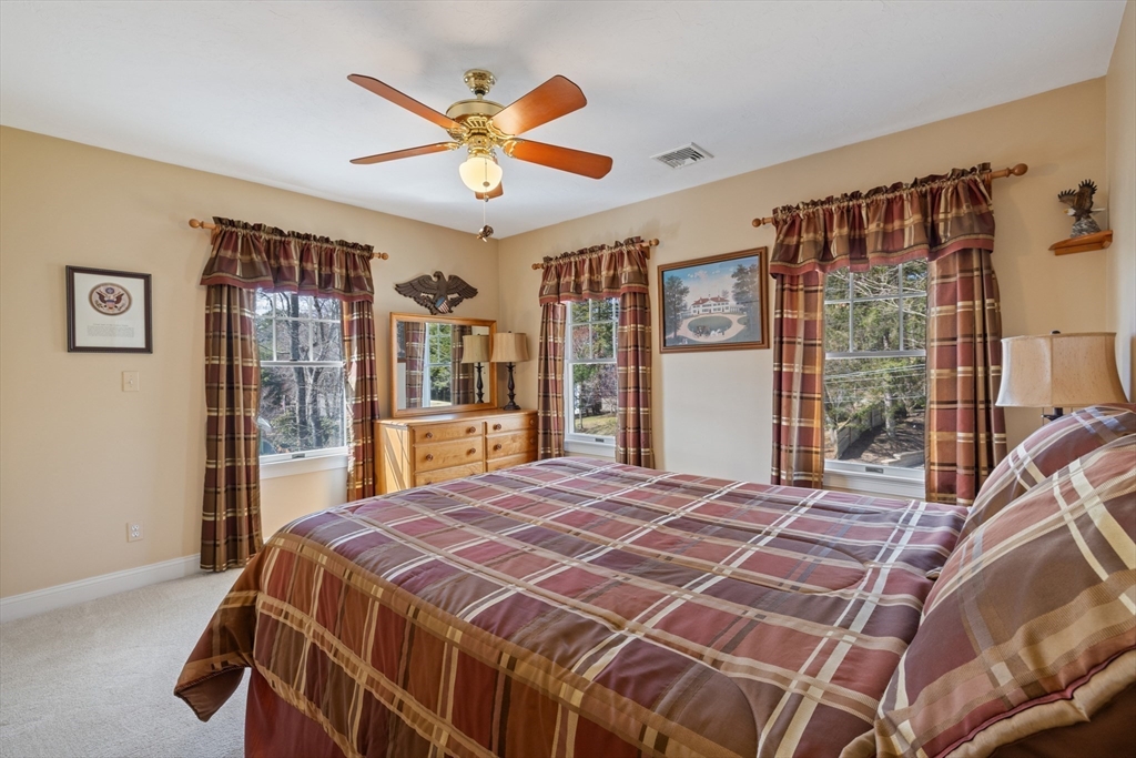 2 Marlboro Road Lexington, MA 02421 - Photo 24 of 36 a bedroom with a large bed and a large window