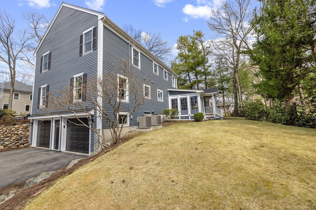 2 Marlboro Road Lexington, MA 02421 - Photo 36 of 36 a front view of a house with a yard