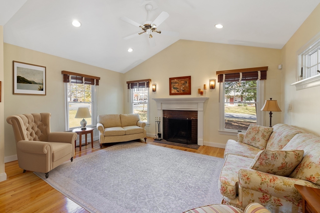 2 Marlboro Road Lexington, MA 02421 - Photo 10 of 36 a living room with furniture and a fireplace