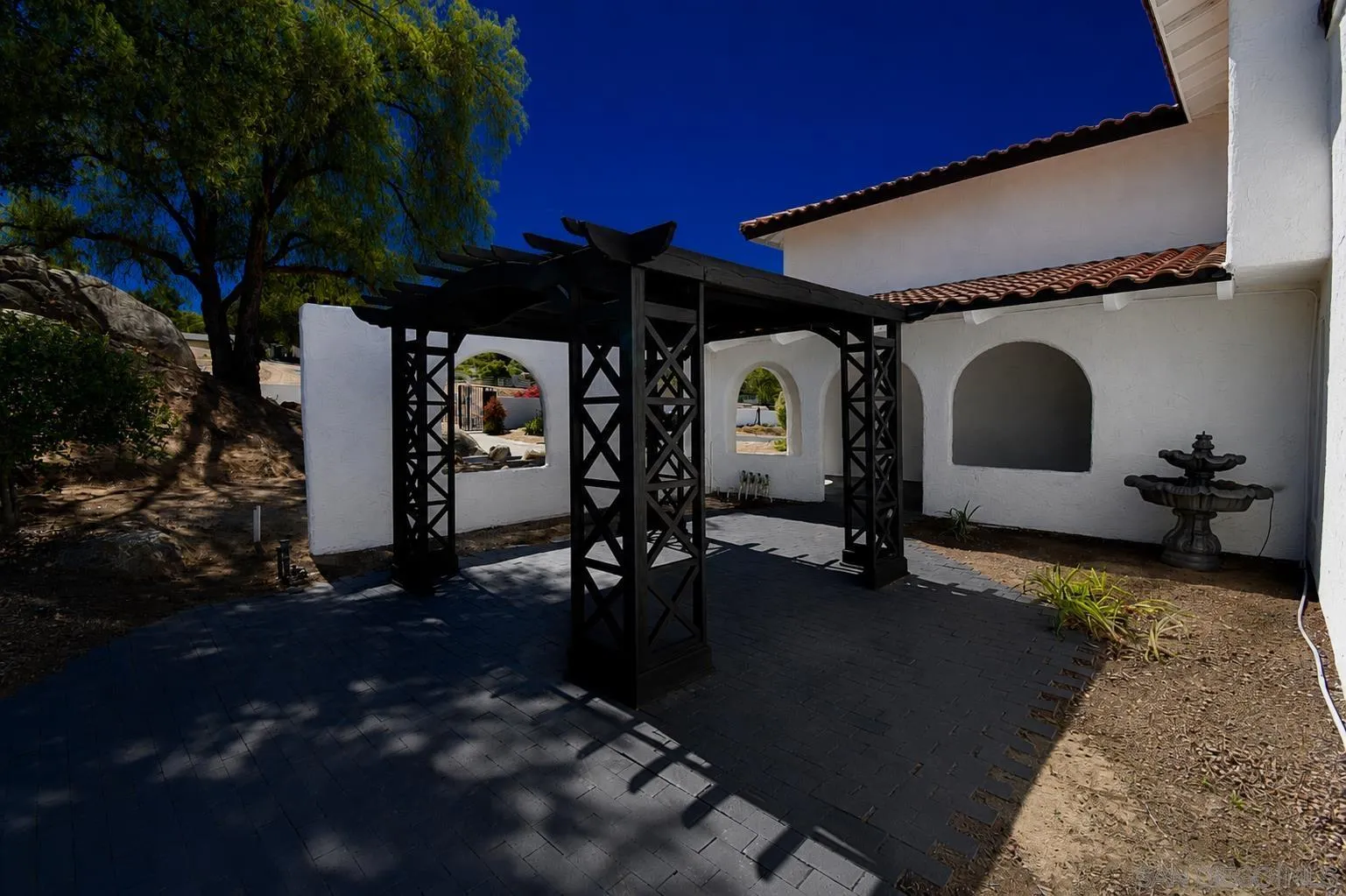 614 Sneath Way Alpine, CA 91901 - Photo 59 of 75 SIDE AREA WITH MULTIPLE CUSTOM ARCHES