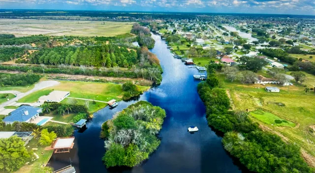 a view of a lake with a yard