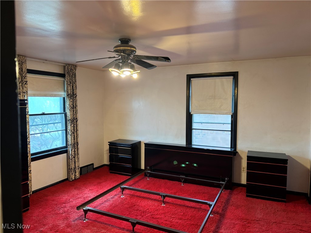 4308 Silsby Road University Heights, OH 44118 - Photo 10 of 28 Carpeted bedroom featuring ceiling fan