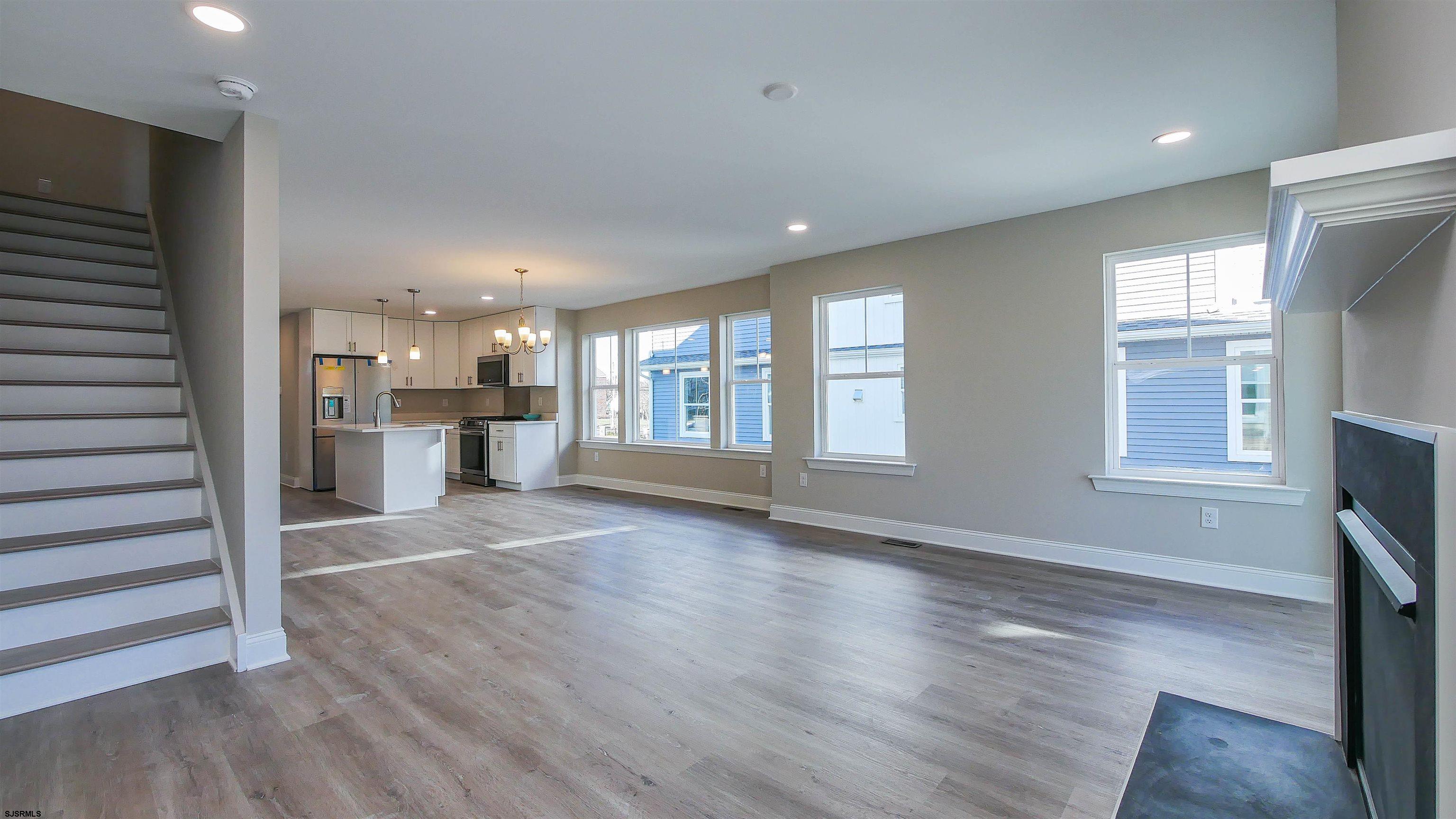 539 Sunset Avenue Somers Point, NJ 08244 - Photo 11 of 34 a view of an empty room with a window and wooden floor