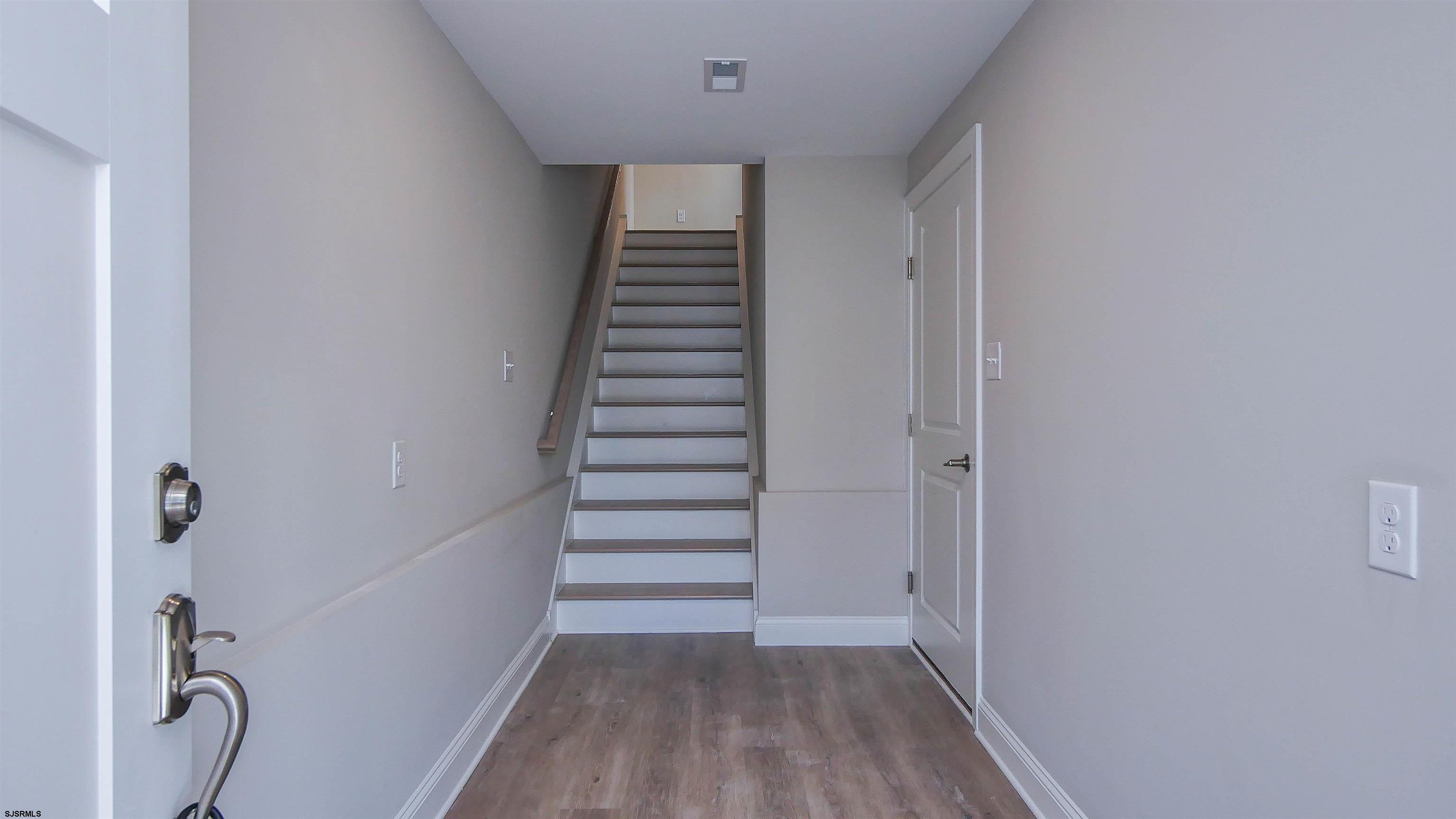 539 Sunset Avenue Somers Point, NJ 08244 - Photo 3 of 34 a view of a hallway with wooden floor and closet