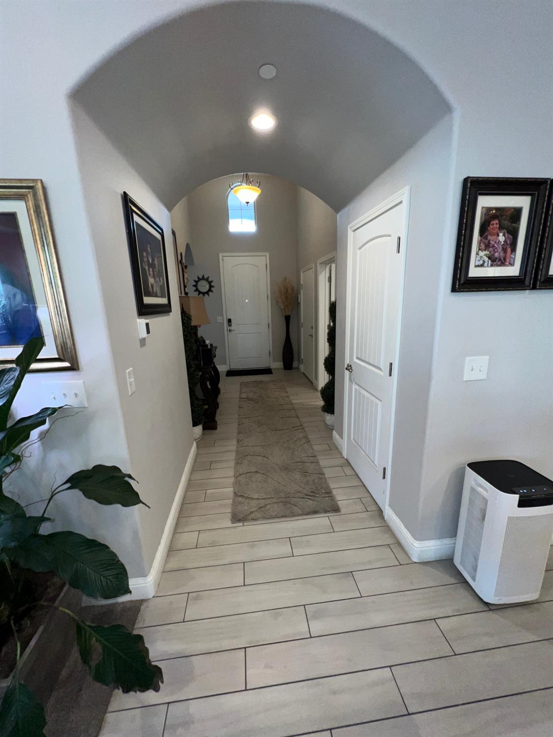889 Coloma Place Madera, CA 93637 - Photo 23 of 61 a bathroom with a sink and a mirror