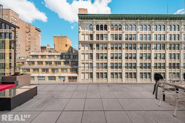 a view of a building from a balcony
