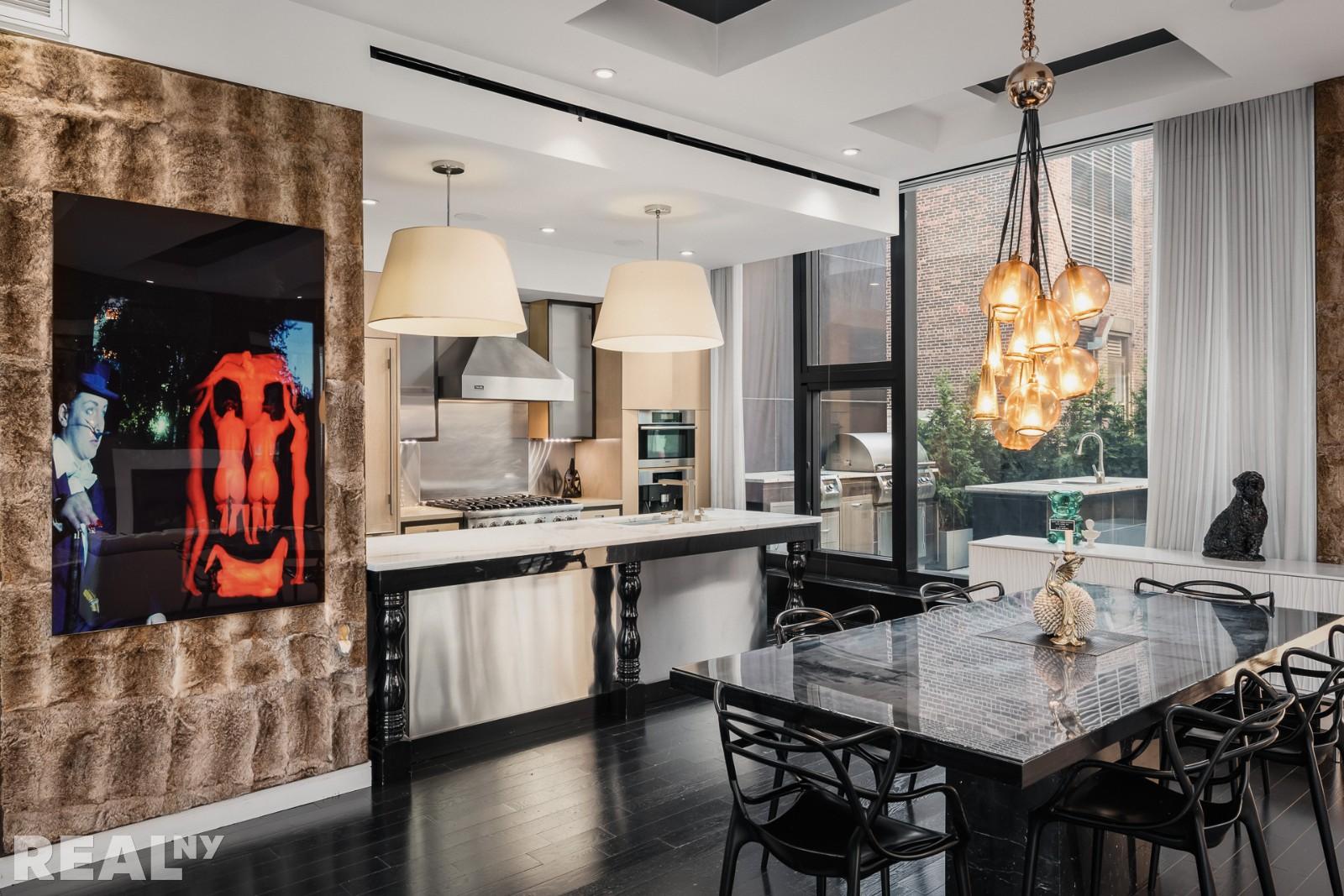 15 Union Square West, Unit 7C Manhattan, NY 10003 - Photo 2 of 18 a kitchen with stainless steel appliances granite countertop a stove a sink and a refrigerator