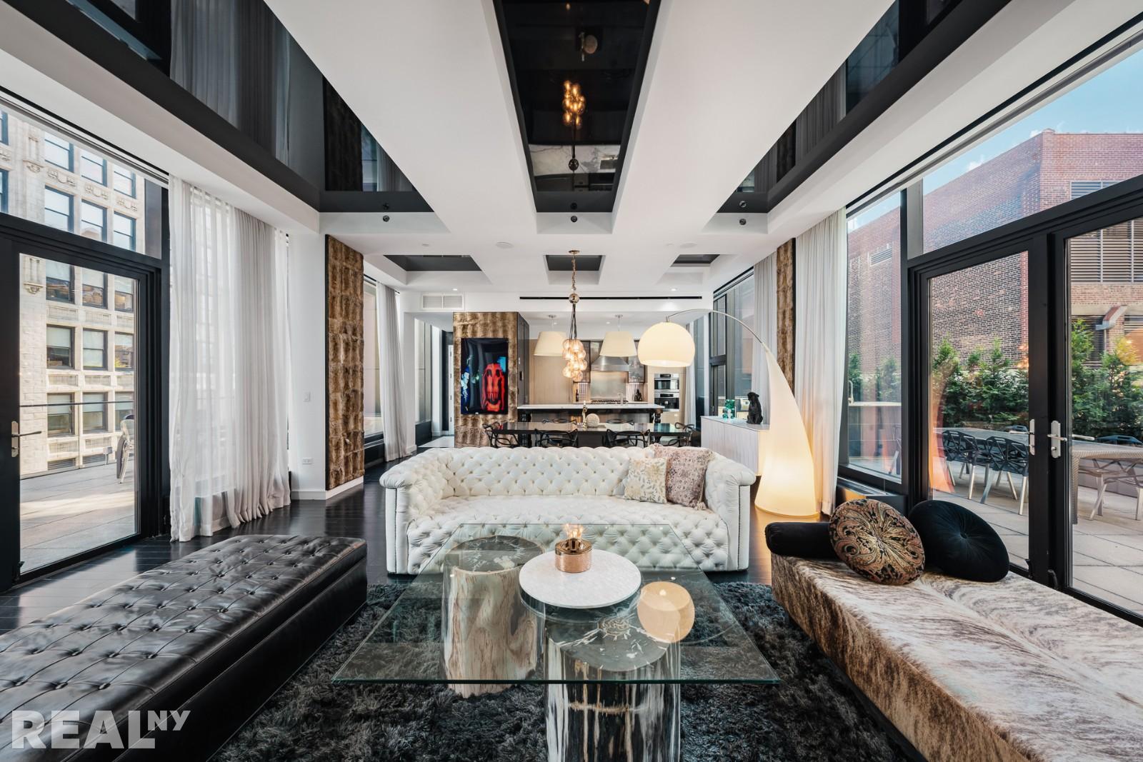 15 Union Square West, Unit 7C Manhattan, NY 10003 - Photo 4 of 18 a view of a dining room with furniture window and wooden floor