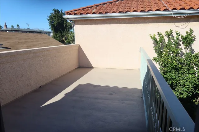 a view of balcony with floor to ceiling window and outdoor space