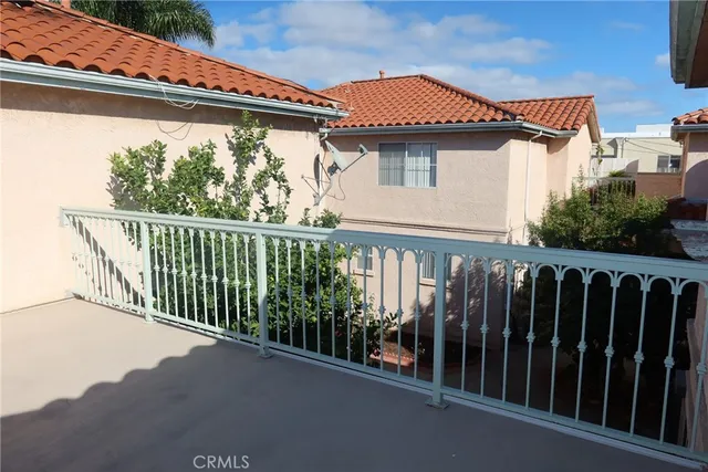 a view of a street from a balcony