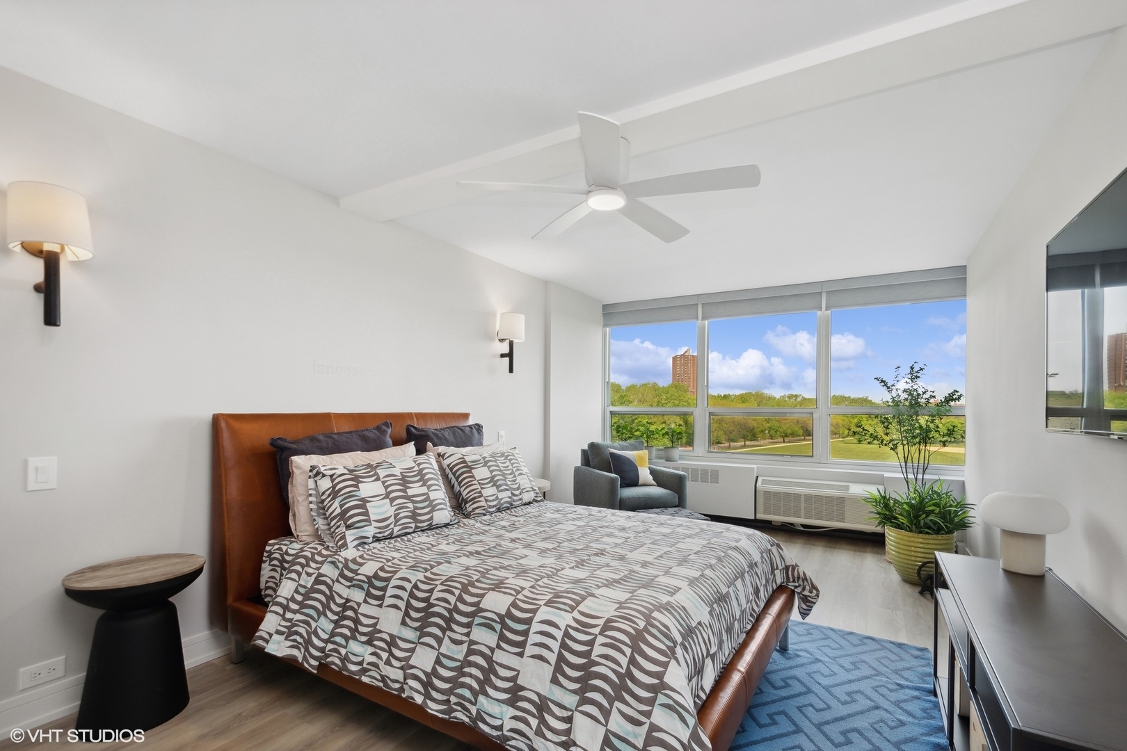 4800 South Chicago Beach Drive, Unit 503N Chicago, IL 60615 - Photo 12 of 15 a bed room with a bed and a window